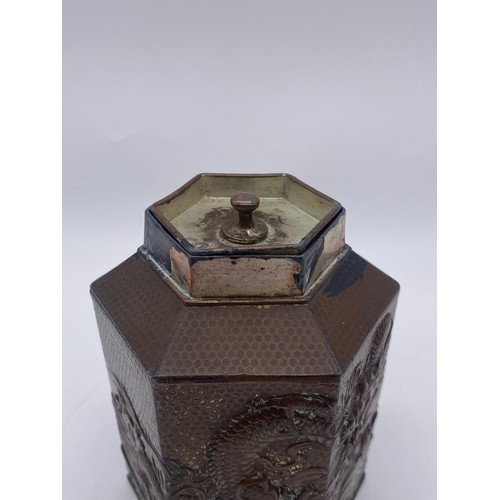 715 - JAPANESE HEXAGONAL COPPER PANELLED TEA CADDY DECORATED WITH CHASING DRAGONS