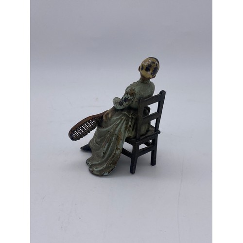 721 - TWO COLD PAINTED METAL FIGURES OF SEATED EDWARDIAN TENNIS PLAYERS