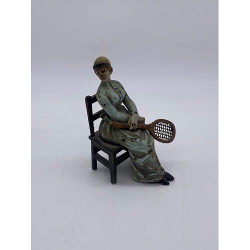 721 - TWO COLD PAINTED METAL FIGURES OF SEATED EDWARDIAN TENNIS PLAYERS