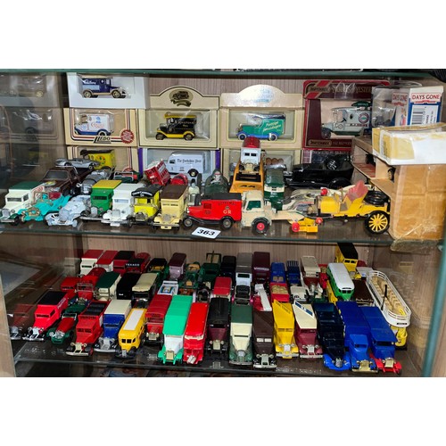 363 - TWO SHELVES OF BOXED AND UNBOXED PAYWORN DIE CAST MODEL CARS AND WAGONS