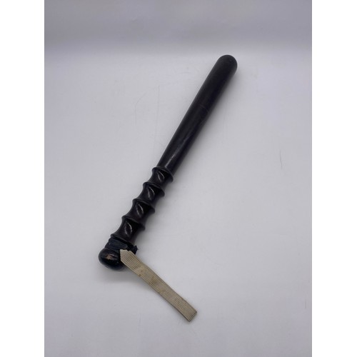 511 - CARVED WOODEN TRUNCHEON