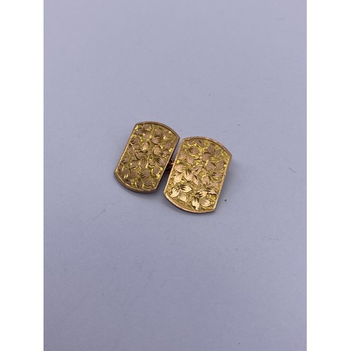 557 - PAIR OF 9CT GOLD ENGRAVED CUFFLINKS 7.5G APPROX