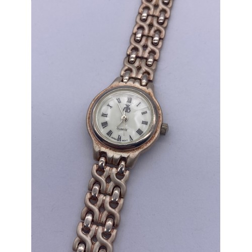 608 - CASED BROOKS AND BENTLEY 925 SILVER DRESS WATCH WITH WITH PEARL EFFECT QUARTZ DIAL