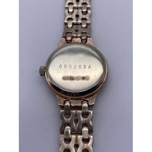 608 - CASED BROOKS AND BENTLEY 925 SILVER DRESS WATCH WITH WITH PEARL EFFECT QUARTZ DIAL