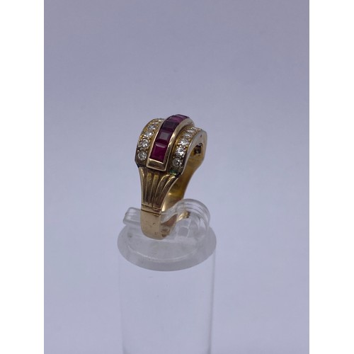 559 - 9CT GOLD RUBY AND DIAMOND CHANNEL SET RING 4.8G APPROX