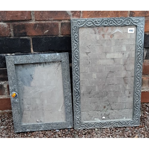 492 - TWO PEWTER FRAMED ARTS AND CRAFTS STYLE MIRRORS