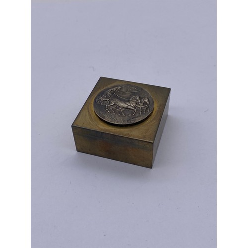 609 - BOXED LALAoUNIS 925 COIN SQUARE BLOCK BRASS PAPERWEIGHT