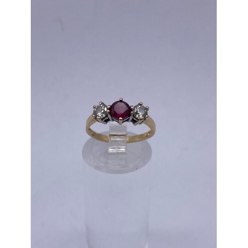 579 - 14CT GOLD RUBY AND CZ DRESS RING SIZE J 2.1G APPROX