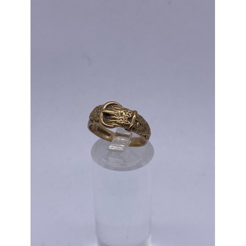 552 - 9CT GOLD BUCKLE RING 2.6G APPROX