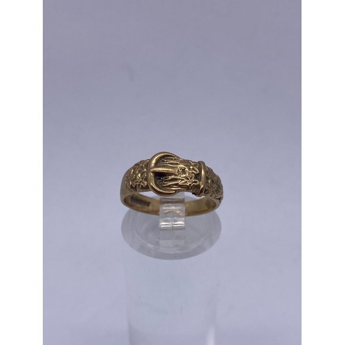 552 - 9CT GOLD BUCKLE RING 2.6G APPROX