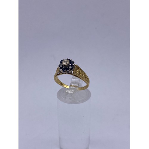 591 - 18CT GOLD DIAMOND CHIP AND SAPPHIRE CLUSTER RING WITH BARK EFFECT SHOULDERS SIZE M 3.9OZ