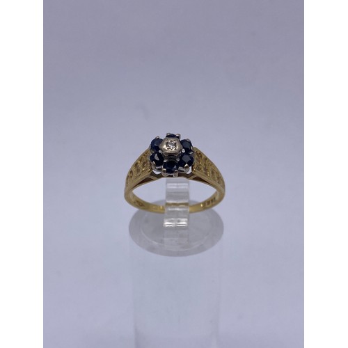 591 - 18CT GOLD DIAMOND CHIP AND SAPPHIRE CLUSTER RING WITH BARK EFFECT SHOULDERS SIZE M 3.9OZ