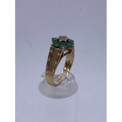 563 - 9CT GOLD EMERALD AND DIAMOND CHIP CLUSTER RING SIZE O 3.3G APPROX