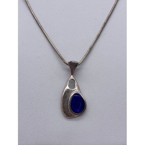 619 - SILVER AND LAPIS LAZULI CABOCHON BANGLE, NECK CHAIN AND PENDANT AND MATCHING DROPPER EARRINGS