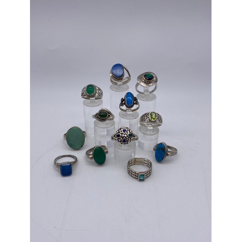 623 - SILVER/WHITE METAL CABOCHON TURQUOISE, MALACHITE AND OTHER BLUE AND GREEN STONE DRESS RINGS