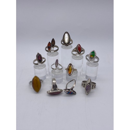 626 - SELECTION OF SILVER MOUNTED LOZENGE SHAPE DRESS RINGS