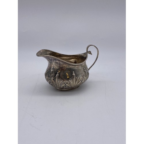 650 - LONDON SILVER CUT CARD DECORATED CREAMER JUG 1.7OZ APPROX