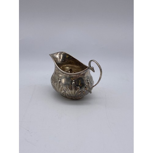 650 - LONDON SILVER CUT CARD DECORATED CREAMER JUG 1.7OZ APPROX