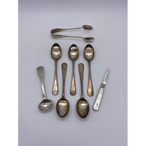 652 - FIVE BIRMINGHAM SILVER TEASPOONS, GEORGIAN PRESERVE SPOON, PAIR OF BIRMINGHAM SUGAR TONGS, AND A SMA... 