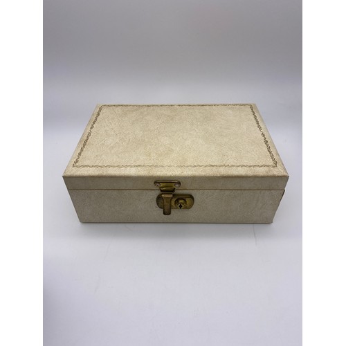 638 - BLACK JEWELLERY BOX AND CONTENTS INC. SIMULATED PEARL STRANDS, BROOCHES AND CUFFLINKS AND TWO OTHER ... 