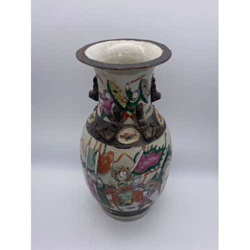 668 - PAIR OF CHINESE CRACKLE GLAZED BALUSTER VASES PAINTED WITH WARRIORS AND APPLIED LIZARDS