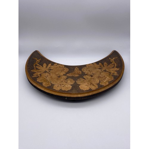 659 - CRESCENT SHAPED POKER WORK TRIVET