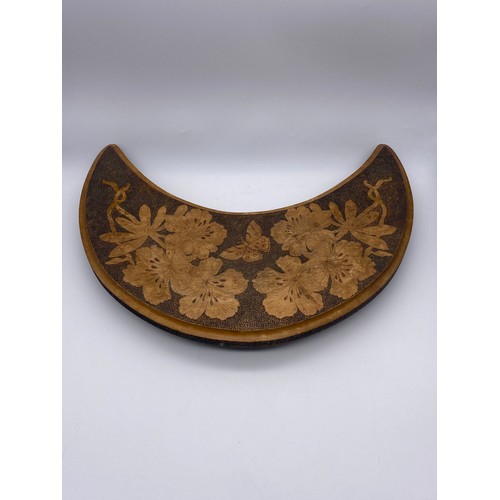 659 - CRESCENT SHAPED POKER WORK TRIVET