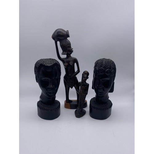 665 - PAIR OF EBONY CARVED AFRICAN BUSTS, AND TWO HARDWOOD FIGURES