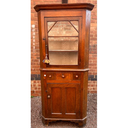 113 - LATE GEORGIAN OAK FULL UPRIGHT CORNER CUPBOARD WITH GLAZED DOOR 192CM HEIGHT APPROX