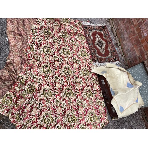 177 - SUITCASE CONTAINING FLORAL BROCADE CURTAINS AND RUG