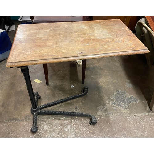 141 - CAST IRON BASED ADJUSTABLE TABLE