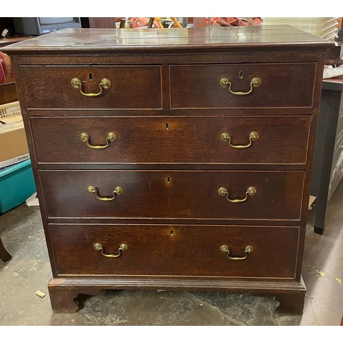 121 - GEORGE III OAK TWO OVER THREE DRAWER CHEST ON BRACKET FEET