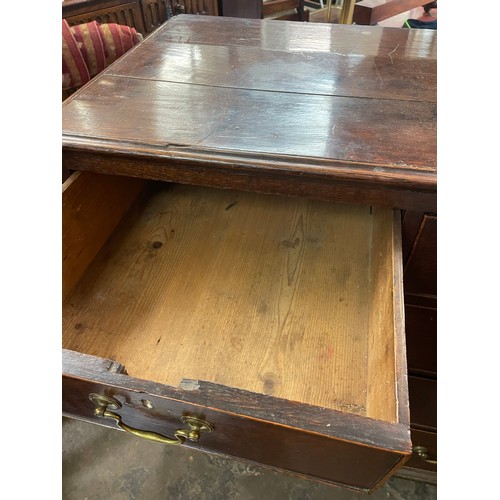 121 - GEORGE III OAK TWO OVER THREE DRAWER CHEST ON BRACKET FEET