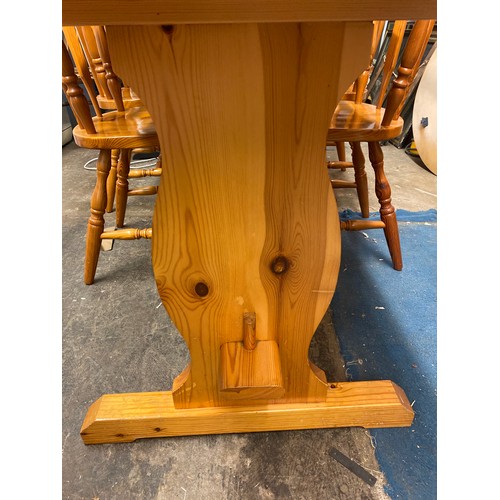 29 - PINE FARMHOUSE TYPE REFECTORY TABLE AND SIX CHAIRS (ONE MATCHED)