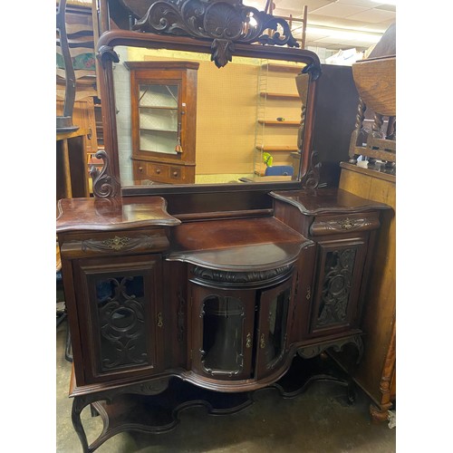 137 - LATE VICTORIAN MAHOGANY BOW FRONTED GLAZED CARVED MIRROR BACK SIDE BOARD