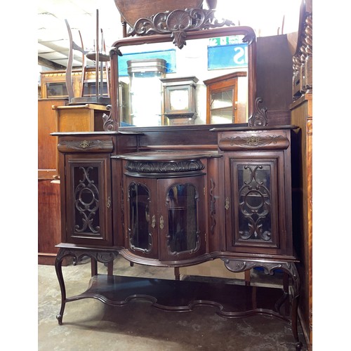 137 - LATE VICTORIAN MAHOGANY BOW FRONTED GLAZED CARVED MIRROR BACK SIDE BOARD