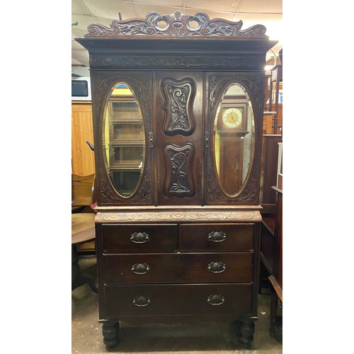 142 - EDWARDIAN HEAVILY CARVED CHEST CUPBOARD