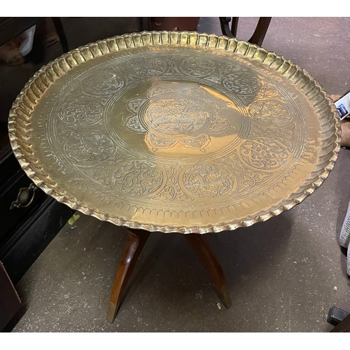 186 - EASTERN ENGRAVED BRASS TRAY TOPPED FOLDING TABLE