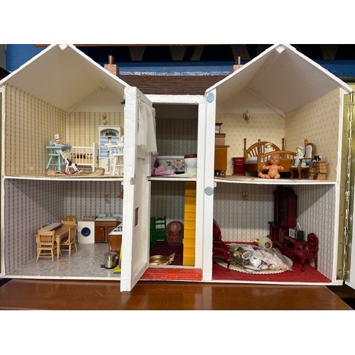 200 - DOUBLE FRONTED MODEL OF A 1920S DOLLS HOUSE INCLUDING FURNITURE CONTENTS