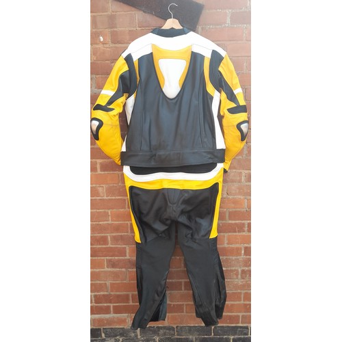 130 - EVIRON LEATHER BLACK AND YELLOW 4XL MOTOR CYCLISTS JACKET AND TROUSERS