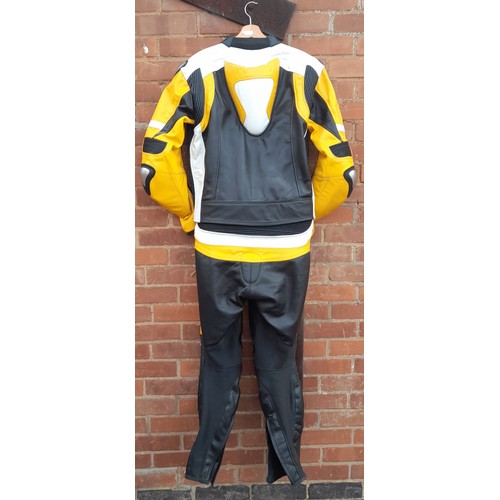 131 - EVIRON LEATHER BLACK AND YELLOW 3XL MOTOR CYCLISTS JACKET AND TROUSERS