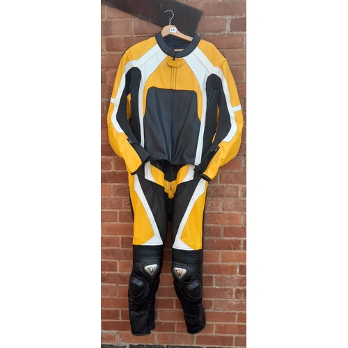 131 - EVIRON LEATHER BLACK AND YELLOW 3XL MOTOR CYCLISTS JACKET AND TROUSERS