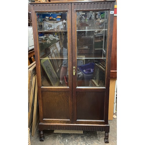 86 - OAK GLAZED DOOR CABINET