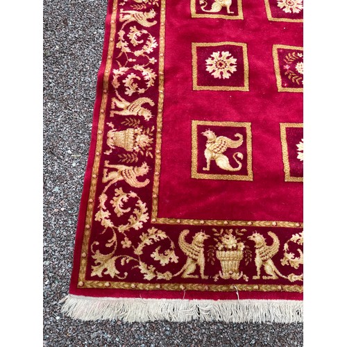 22 - RED AND GOLD GRIFFIN LEAF PATTERN CARPET 305cm X 200cm