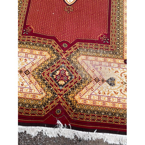 21 - RED AND CREAM GROUND PATTERN CARPET 335 cm x 240cm