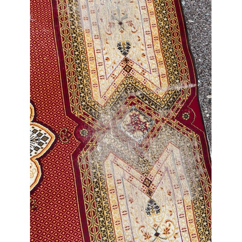 21 - RED AND CREAM GROUND PATTERN CARPET 335 cm x 240cm