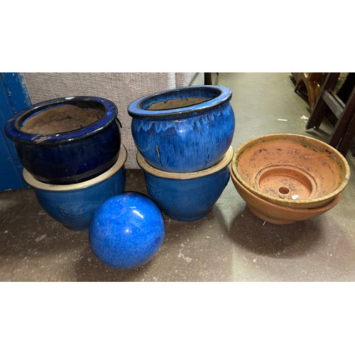 185 - THREE BLUE GLAZED PLANTERS AND PAIR OF TERRACOTTA SHALLOW BOWLS