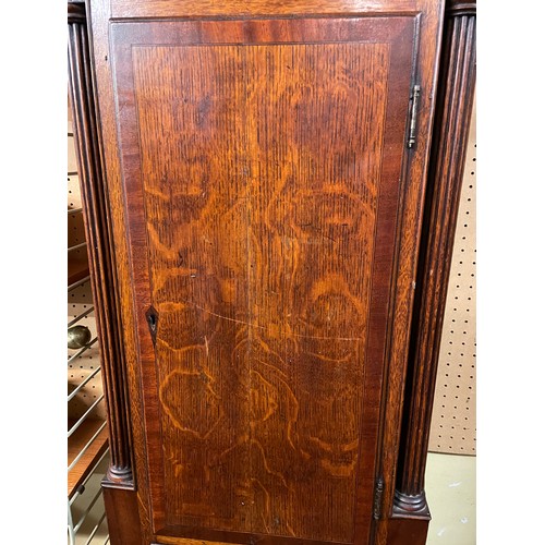 194 - MAHOGANY AND OAK INLAID LONG CASED CLOCK WITH BRASS ARCHED DIAL SIGNED THOMAS WATTS OF BURY A/F