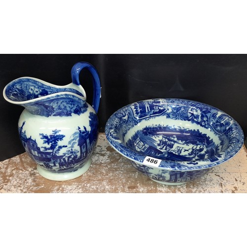 486 - BLUE AND WHITE PRINTED POTTERY WASH BOWL AND JUG