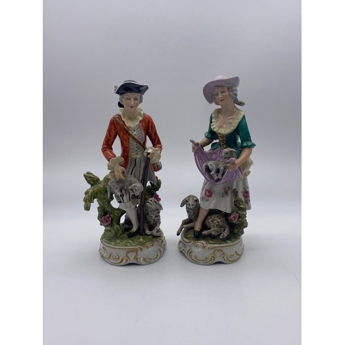 555 - PAIR OF MEISSEN STYLE 18TH CENTURY SHEPHERD AND SHEPHERDESS FIGURES